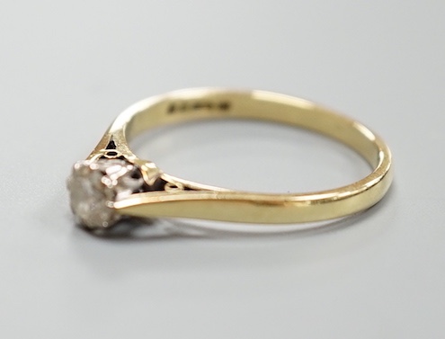 A modern 18ct gold and solitaire diamond ring, size N, gross weight 2.5 grams.